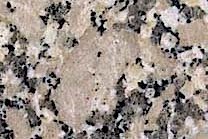 A pink-grey granite with a medium texture.