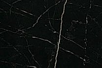 A dark background marble that has a dark brown and black color with white veins.