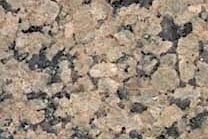 A yellow granite with a coarse texture.