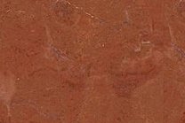 A red and orange marble with some veins.