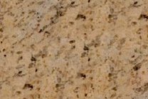 A yellow and brown granite with veins.