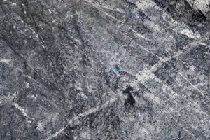 A black and grey granite with veins.